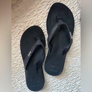 Women’s Reef black Cushion glittery flip-flops, size 7. Cross-posted.